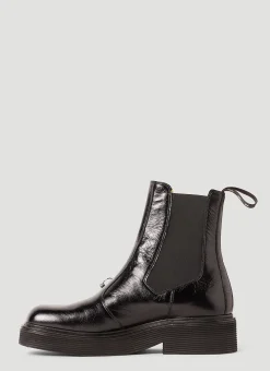 Pierced Chelsea Boots