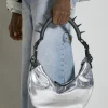 Spike Handle Half Moon Shoulder Bag